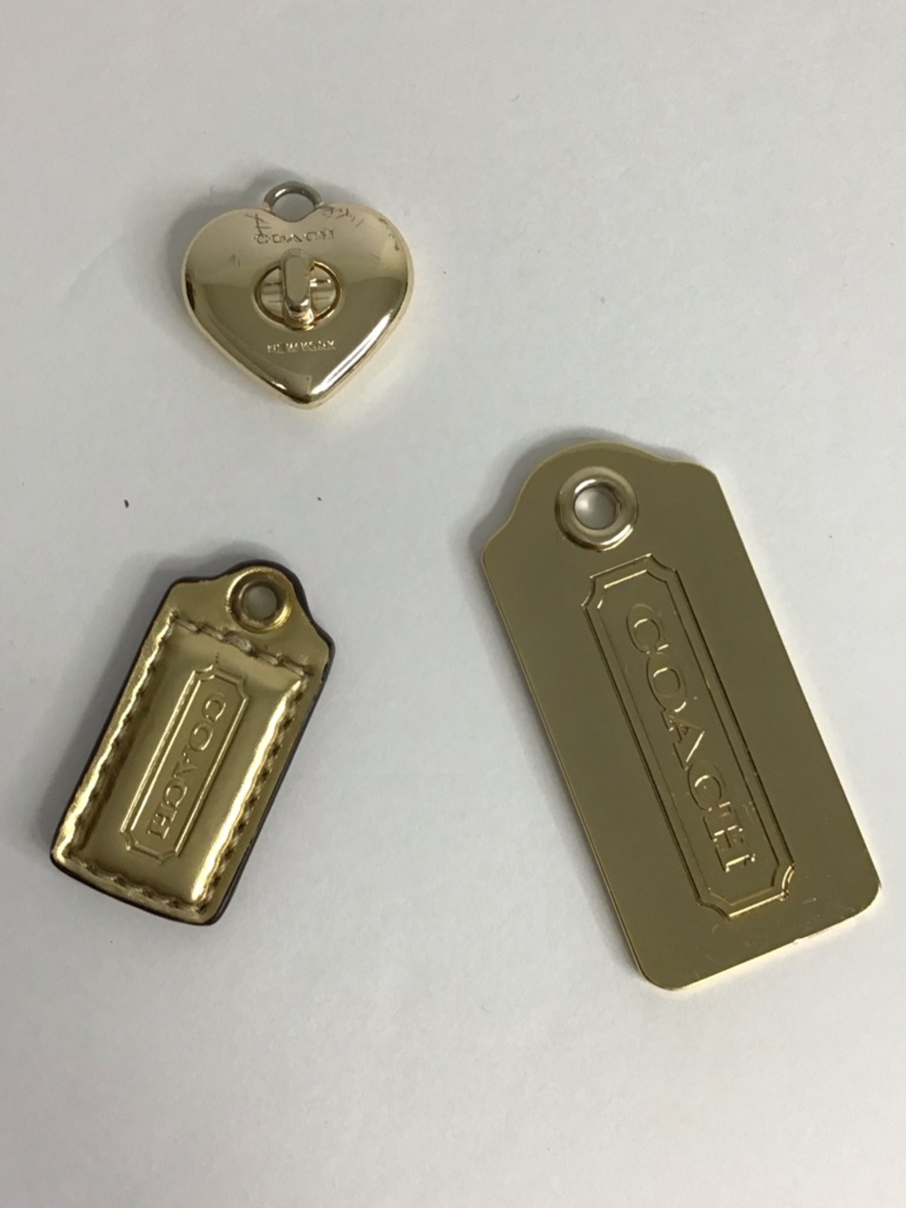 Coach gold hangtags